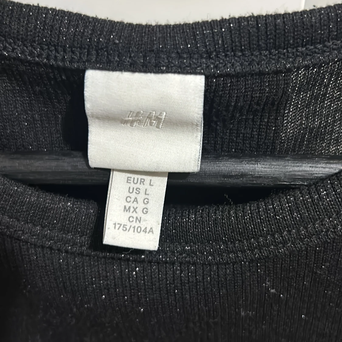 Svart glittrig croppad topp från H&M - 90