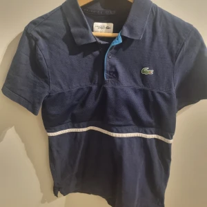 Lacoste Piké - Inga hål eller fläckar.