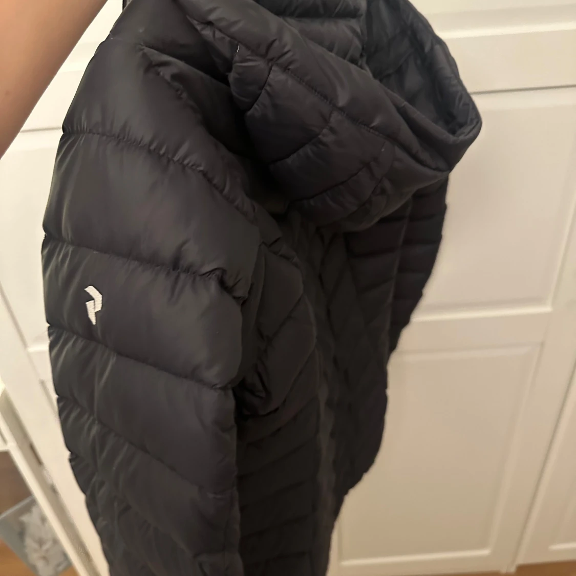 Svart dunjacka Peak Performance - 91