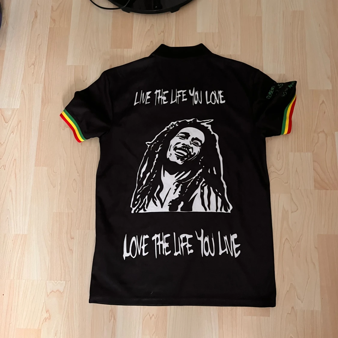 Svart fotbollströja med Bob Marley-motiv - 90