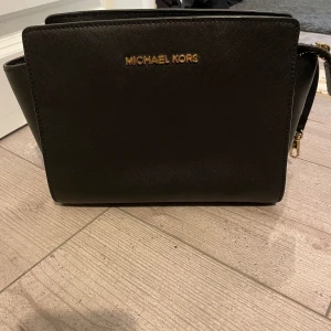 Fin MK väska - En snygg väska både till fest och vardag  