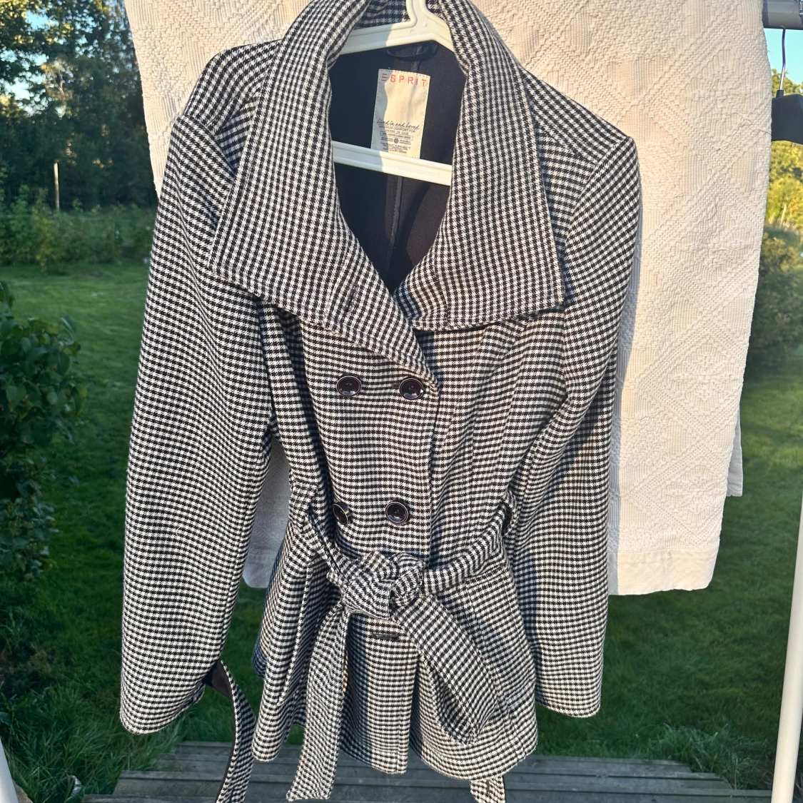 Pepitarutig ullkappa