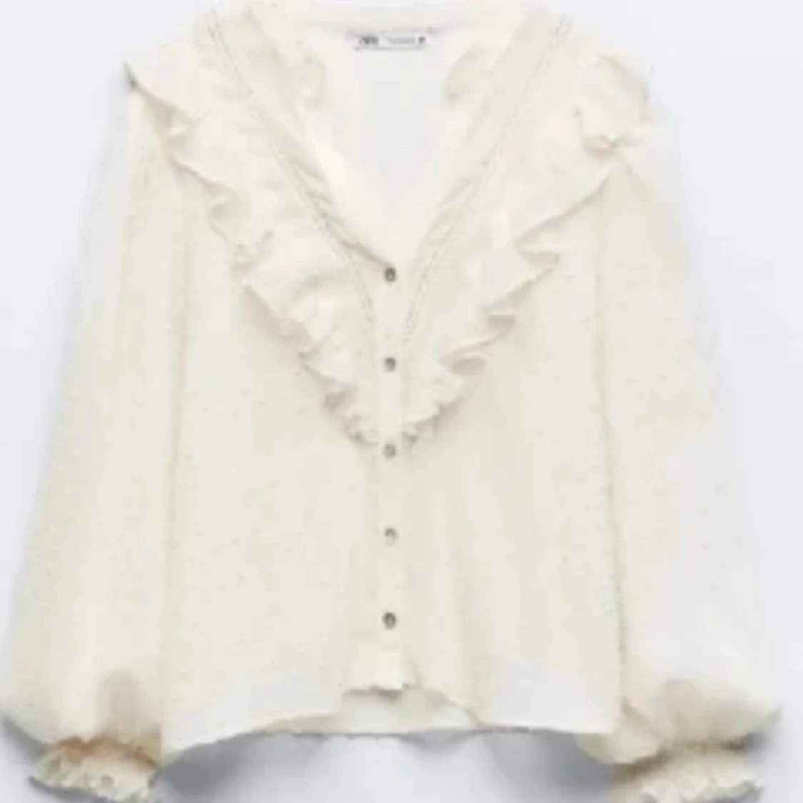 Vit V-ringad blus