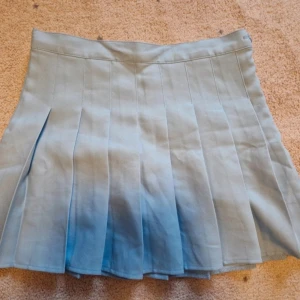 Babyblå tennis kjol - Med säkerhets shorts 