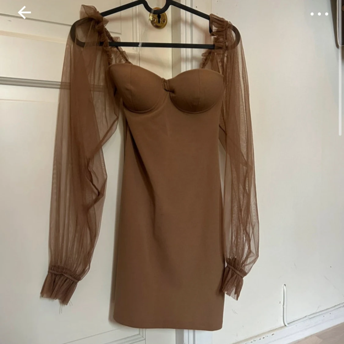 Ballongärmad klänning