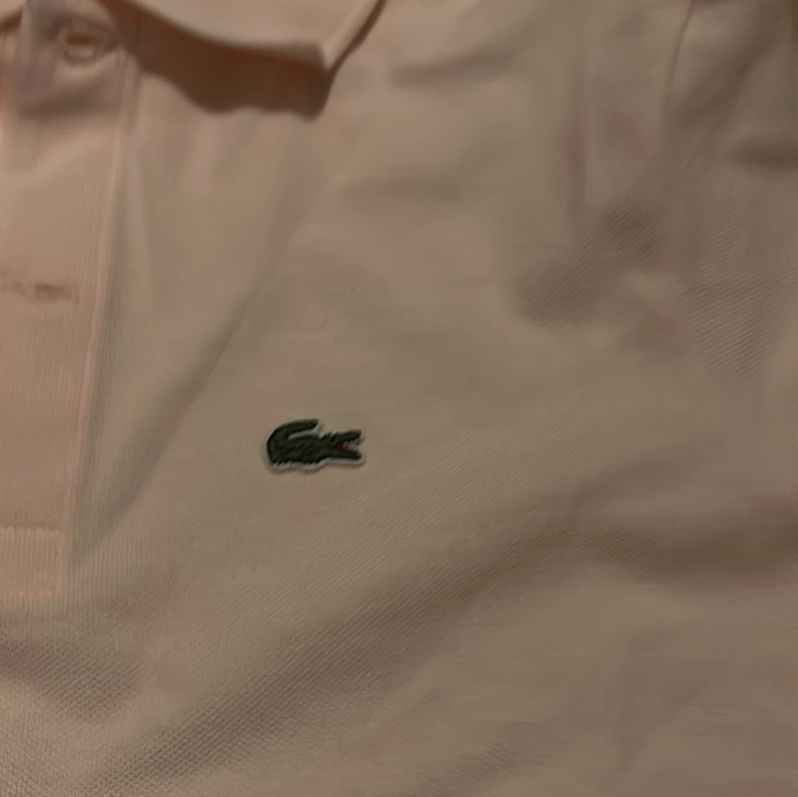 Ljusrosa pikétröja från Lacoste - 3