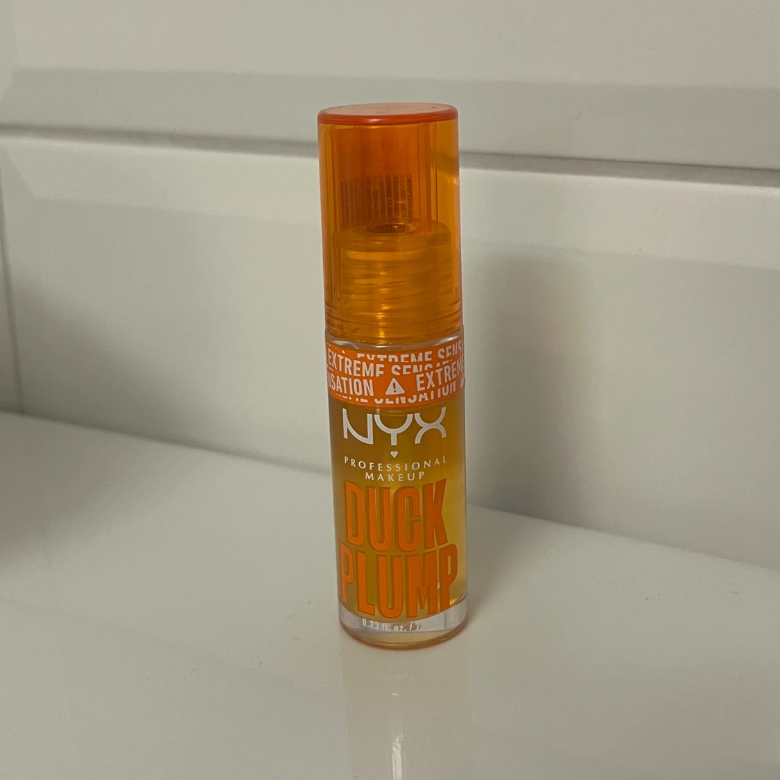 NYX Professional Makeup Filler Instinct Plump Lip Polish färgen: clearly spicy