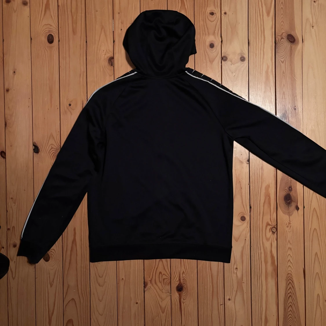 Svart zipkofta från Nike - 1