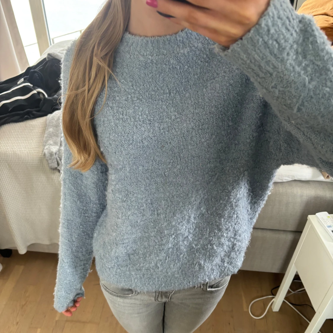 Ljusblå stickad tröja