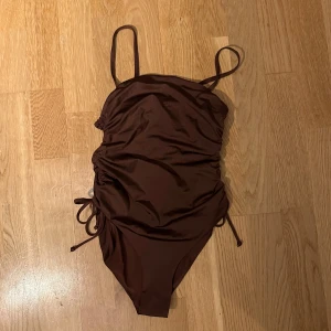 Brun baddräkt - Brun baddräkt från HM, aldrig använd. Storlek S 