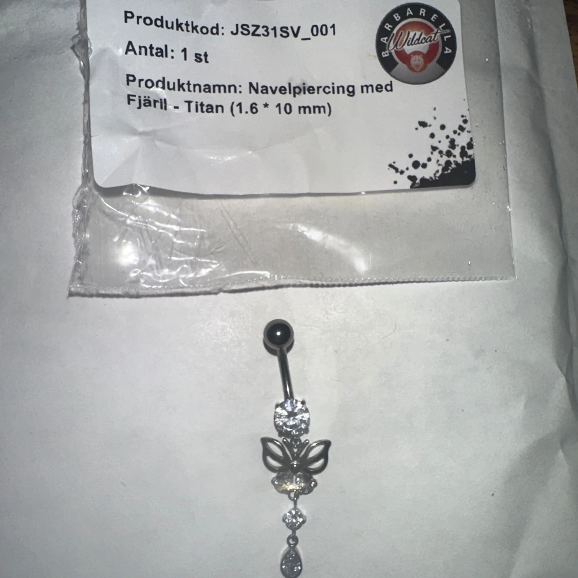 Navelpiercing med fjäril i titan - 1