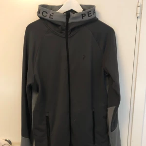 Peak Performance Tröja - Zip Luvtröja Använt skick