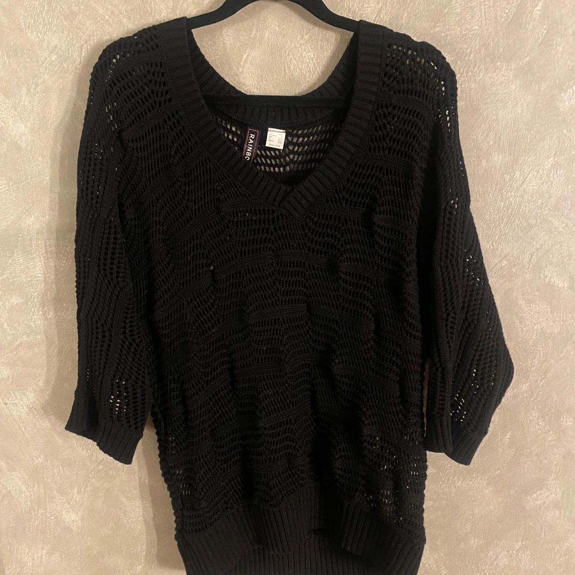 Svart stickad tröja från Rainbow