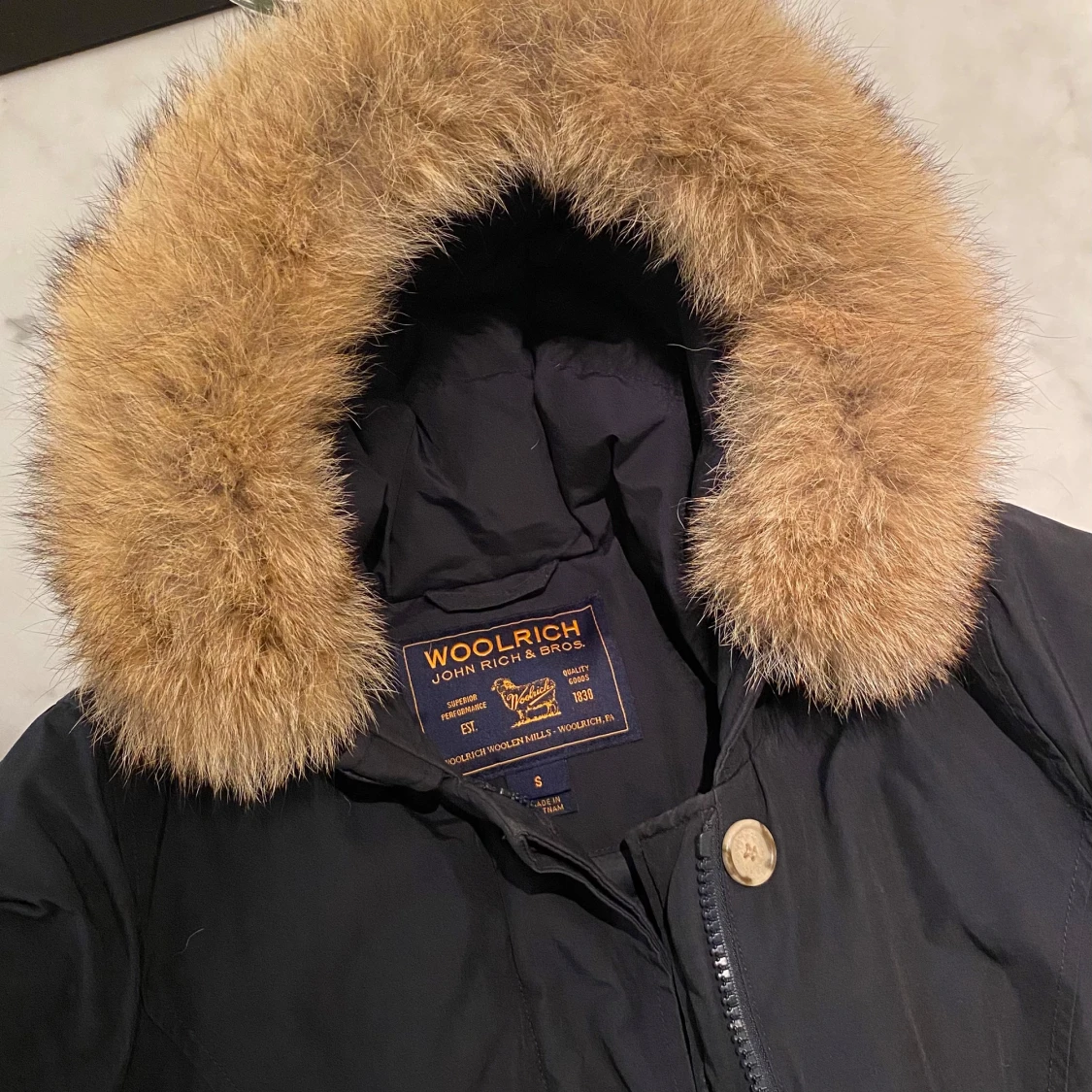 Woolrich jacka - mörkblå, med päls - 91