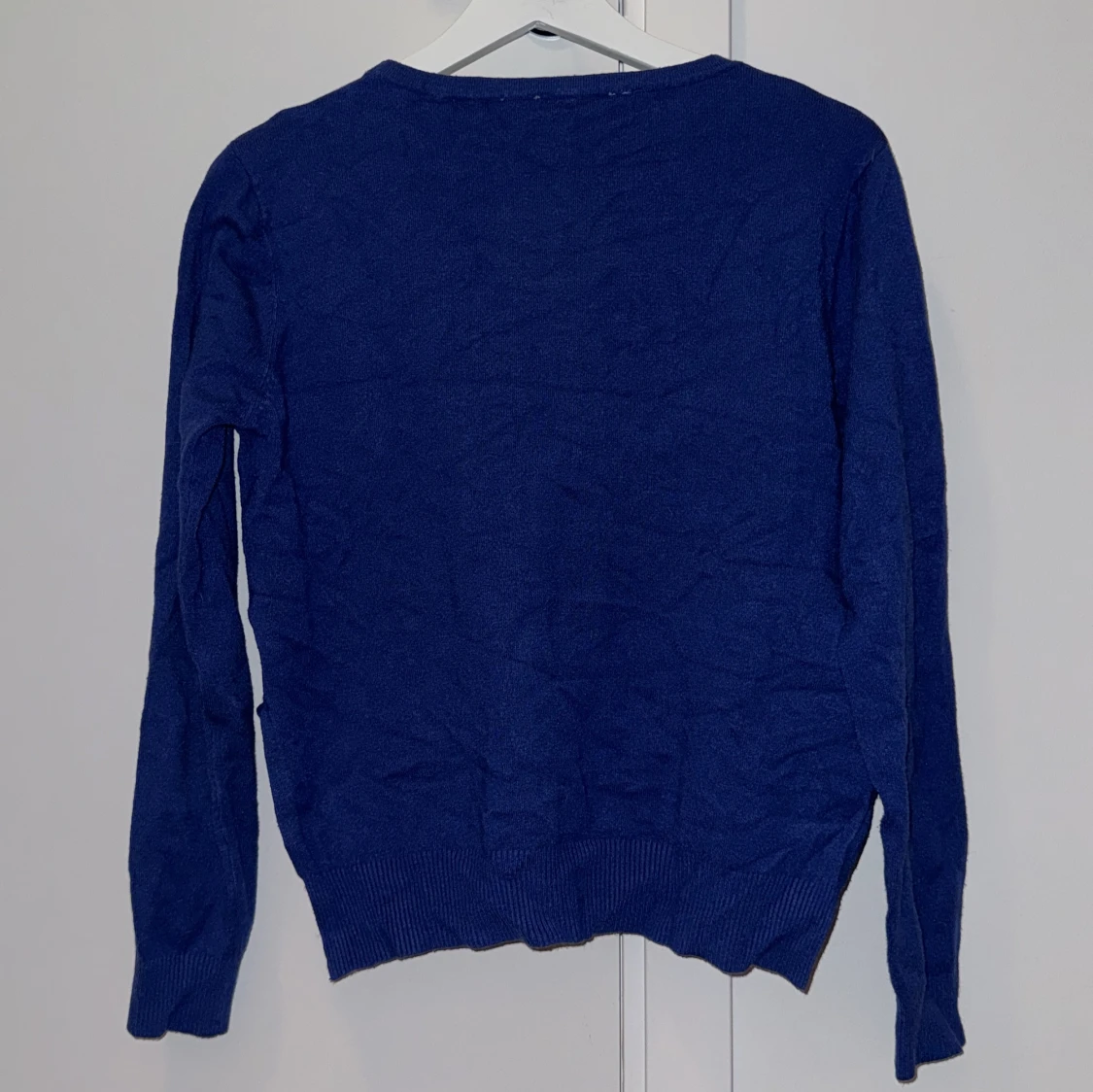 Blå stickad tröja - 90