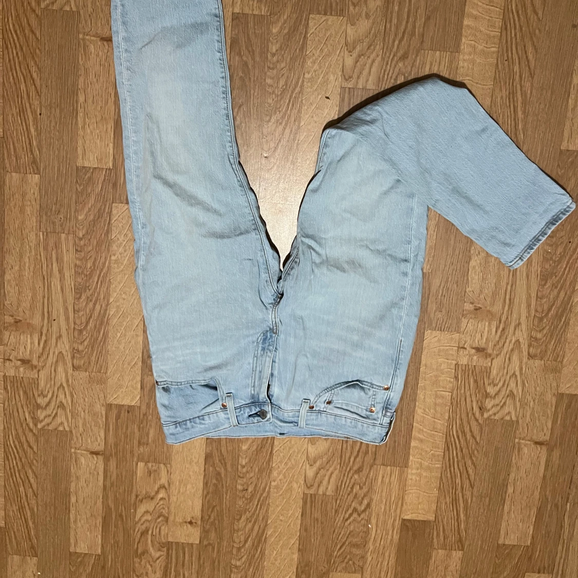 Ljusblå jeansbyxor från Levi's - 90