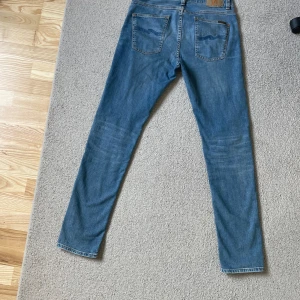 Nudie jeans lean Dean  - Ett par riktigt feta nudie jeans i storleken W32 L34. Jeansen är så gott som nya och endast använd några få gånger. Inga defekter alls. Nypris 1600. Har du frågor är det bara att höra av dig!