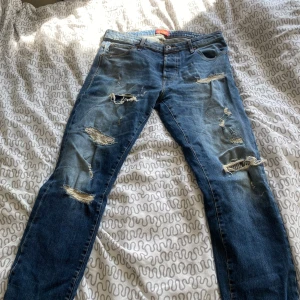 SLIM med slitningar  - Använder inte längre och knappt använda