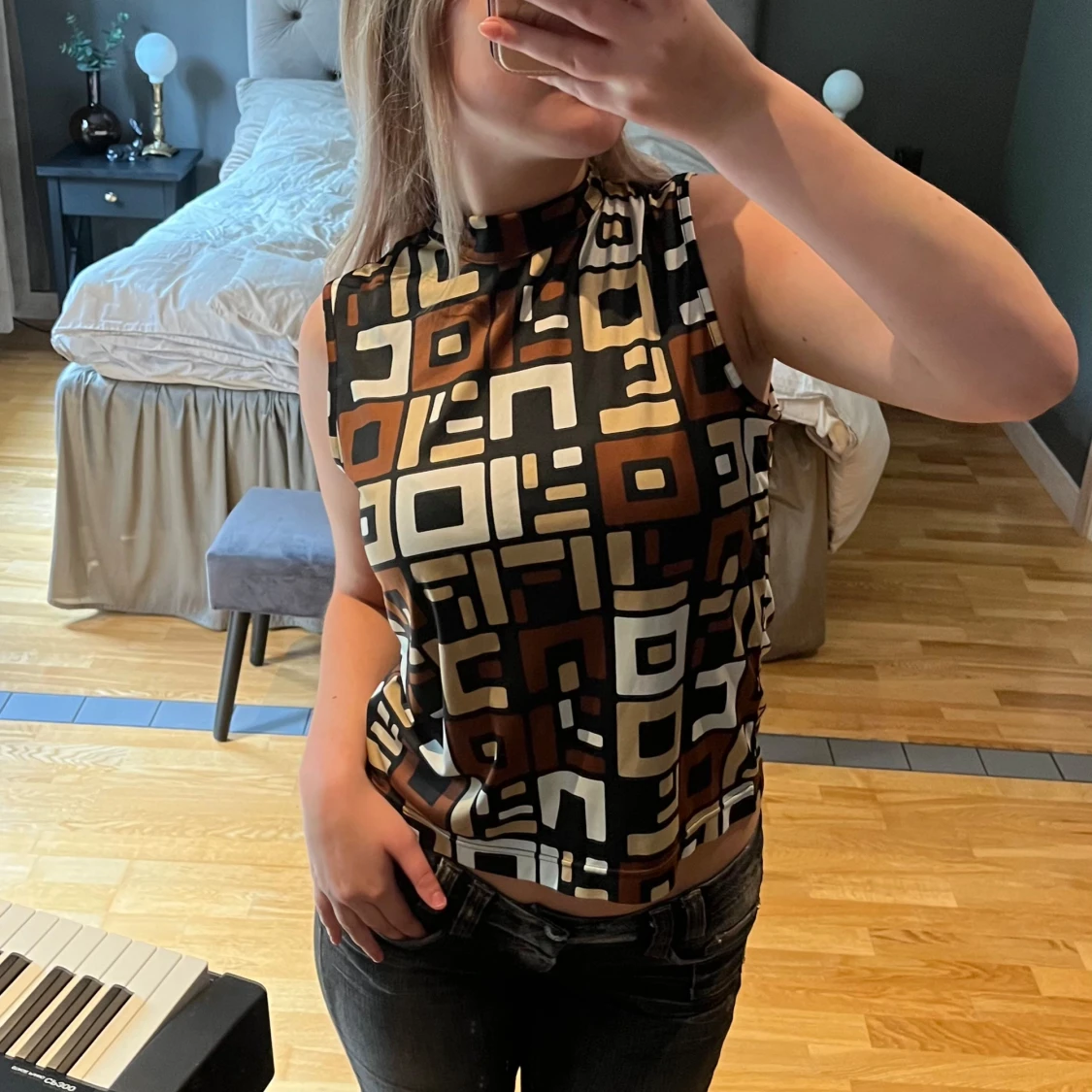 Mönstrad ärmlös topp från Mexx