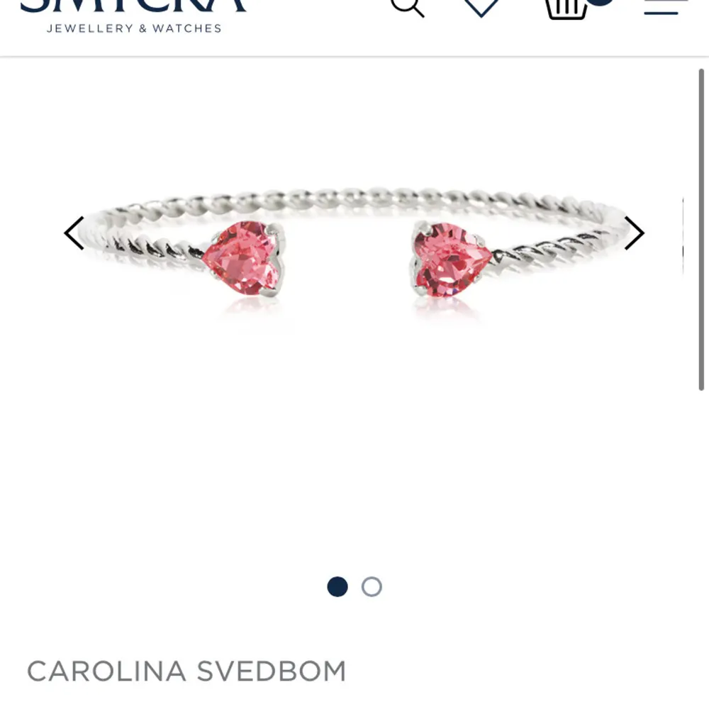 Alla hjärtans dag edition armband från Carolina svedblom. i silver med rosa hjärtformade kristaller. Går inte att köpa i butik längre!! Knappt använd, går att duscha med.. Accessoarer.