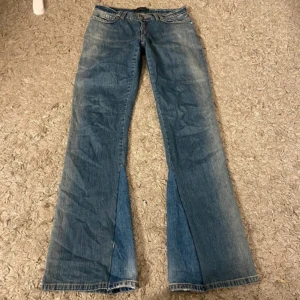 Bootcut Jeans - Flared bootcut low waist to mid rise jeans. 40cm in waist, 76 cm in length 