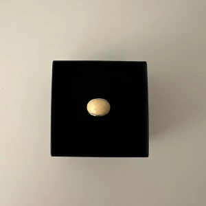 Ring  - Ring med beige färg 