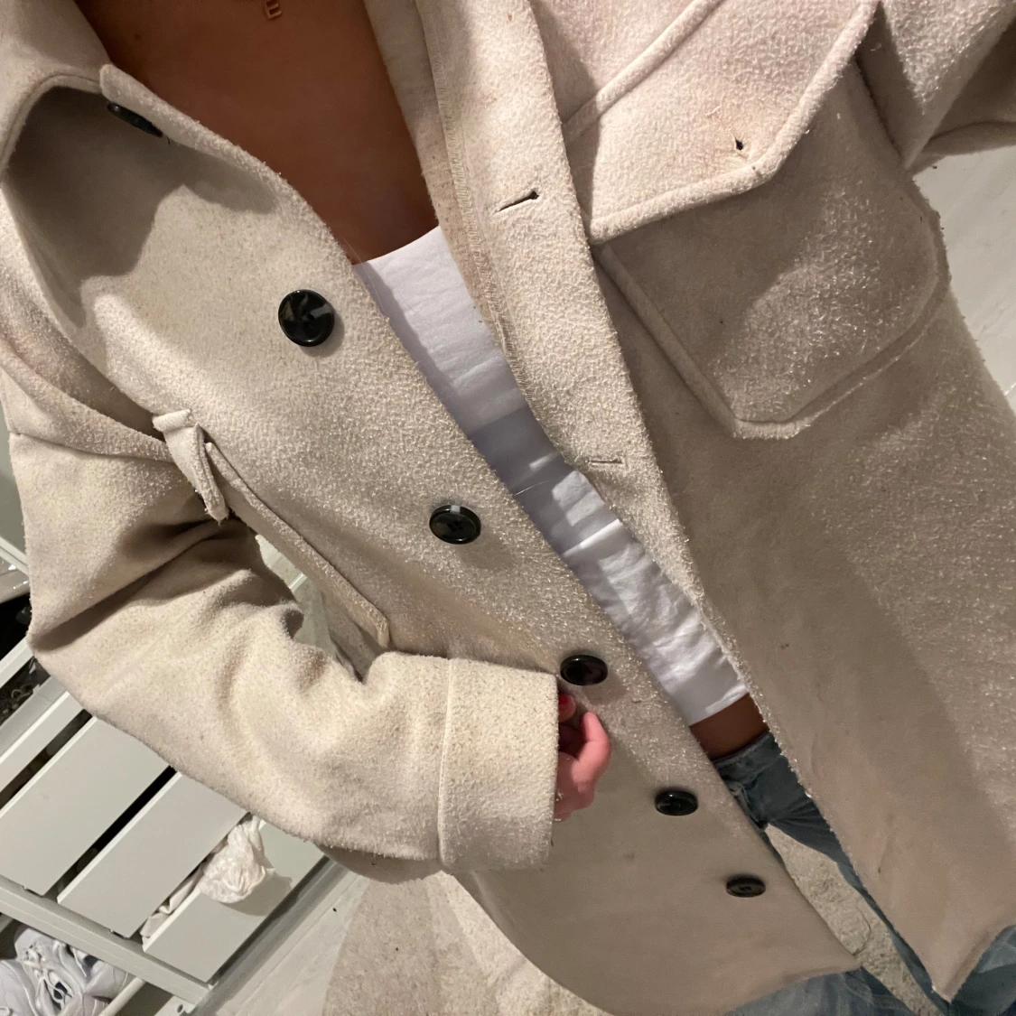 Beige Kappa från Nelly  - 91