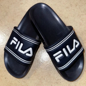 Fila tofflor - Fila tofflor, storlek 36. Sparsamt använt. Se bilder. 