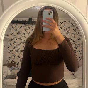 Långärmad topp - Sparsamt använd