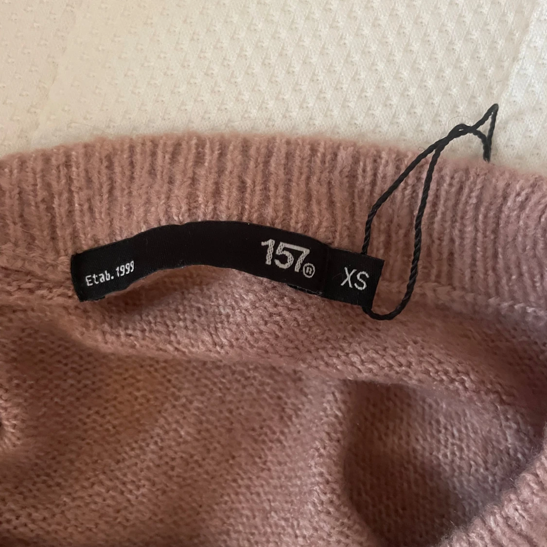 Rosa tröja från 157 - 2