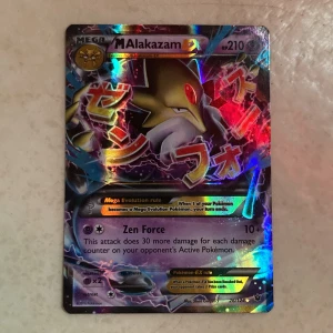 Pokémonkort Mega Alakazam EX 2016 - Kostar 60 kr plus frakt på eBay men vill bli av med det så säljer det för 50 kr. Priset går att diskutera