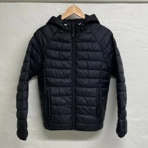 Berhska jacka - Berhska dunjacka i storlek XS.