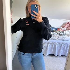 Svart polo  - Snygg polo tröja, stickad