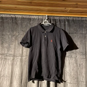 Polo Piké  - I använt skick. 