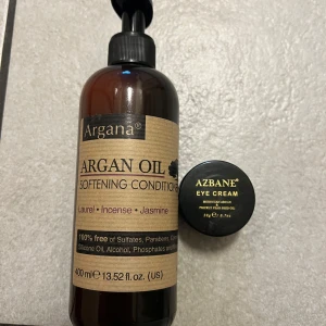 Argana Argan Oil Balsam och Azbane Ögonkräm - Argana Argan Oil Softening Conditioner med doft av lagerblad, rökelse och jasmin. Fri från sulfater, parabener och silikoner. Azbane Eye Cream med arganolja för intensiv återfuktning.