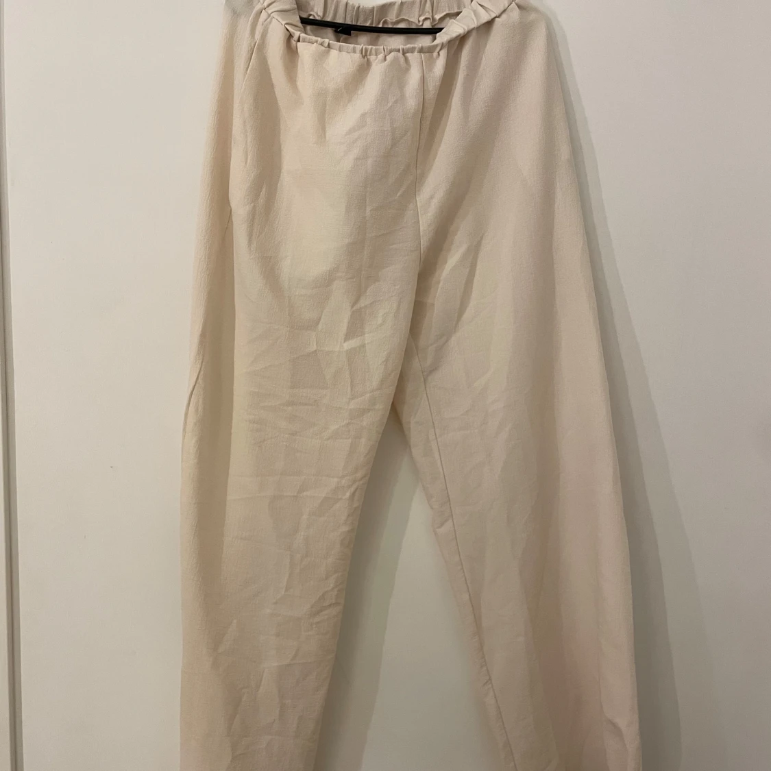 Beige linnebyxor - 90