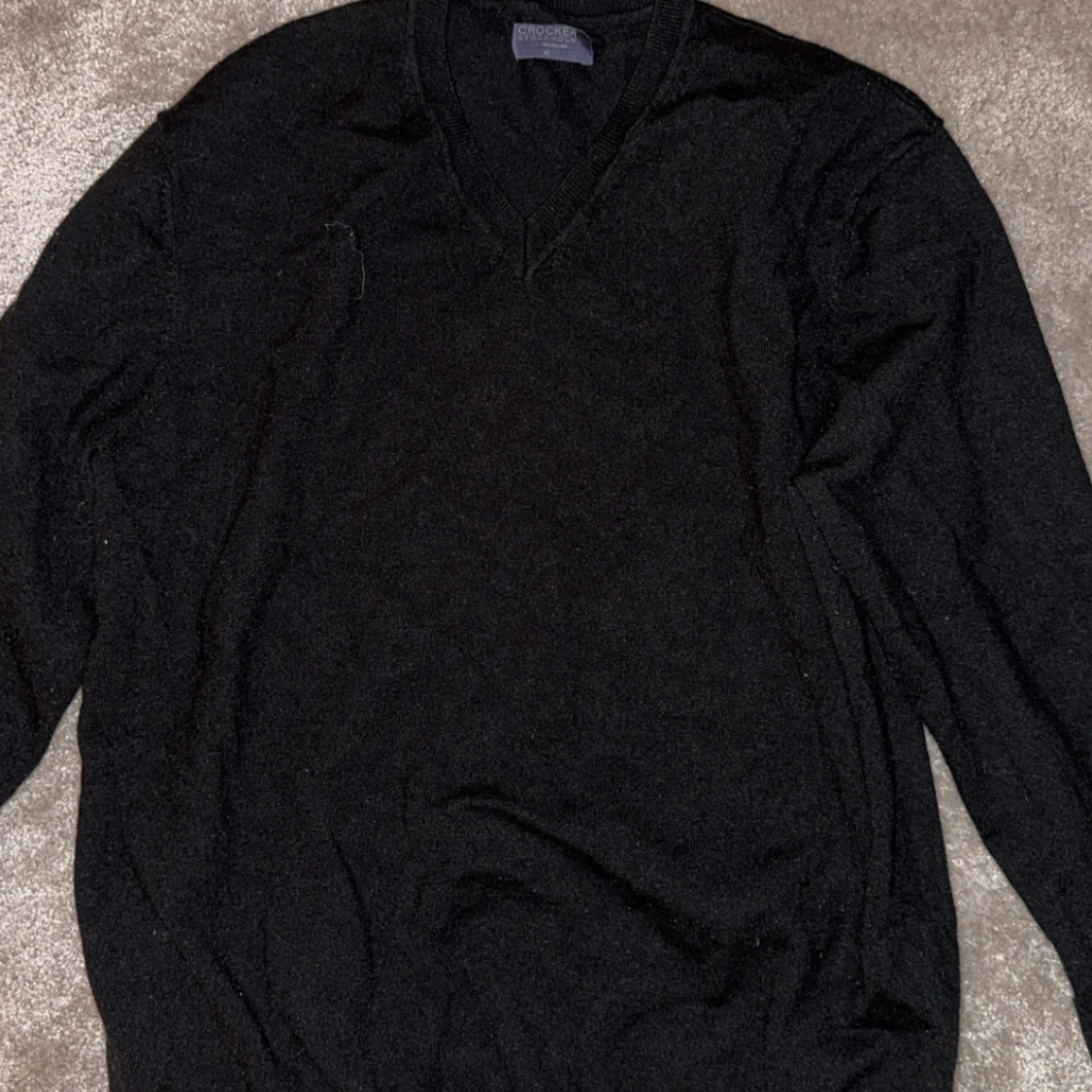 Svart tröja med v-ringning