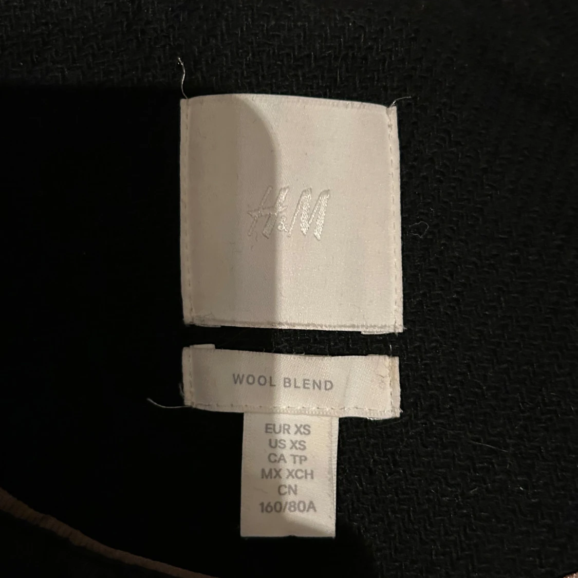 Svart omlottkappa  - 91