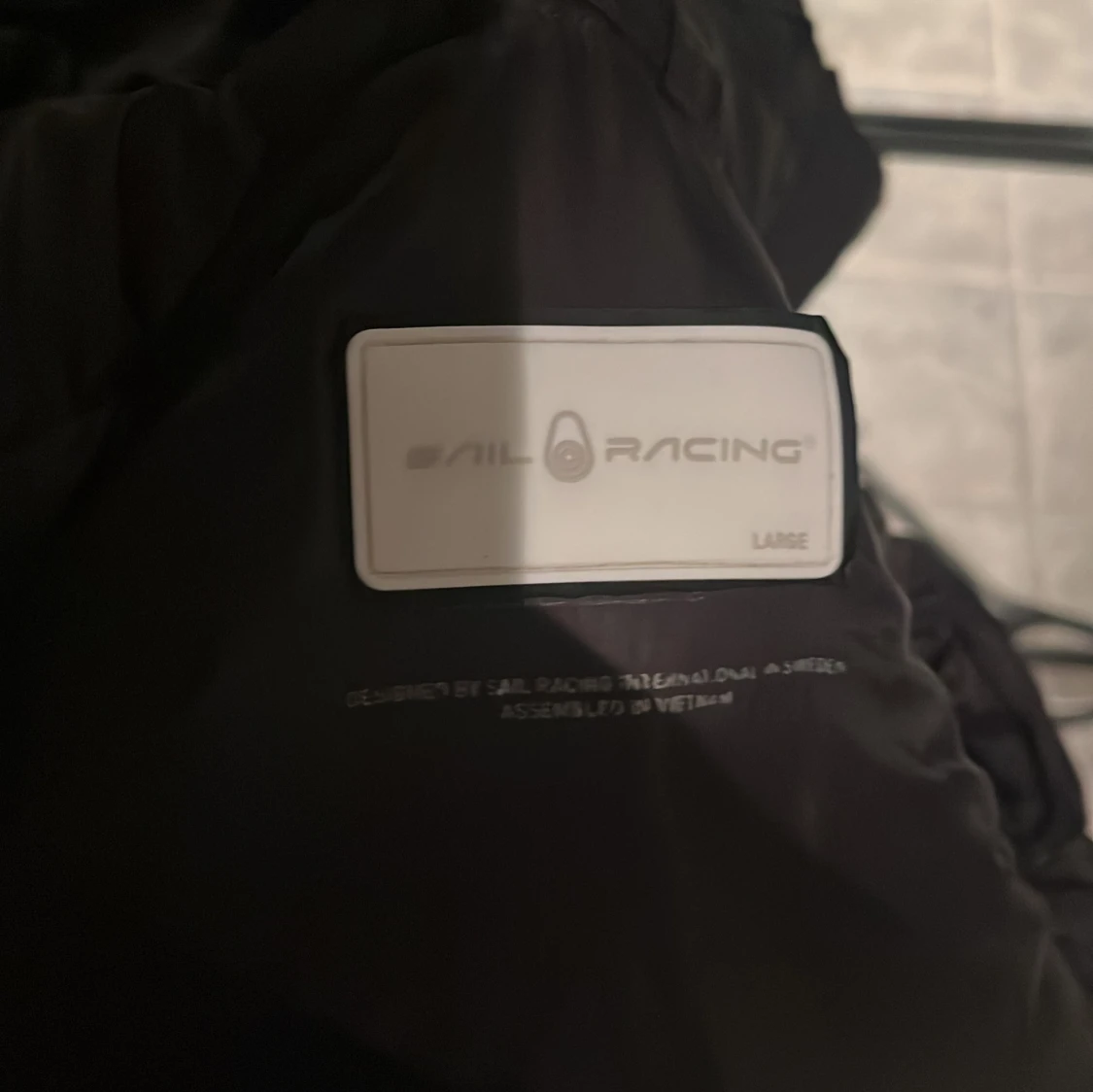 Svart dunjacka från Sail Racing - 92