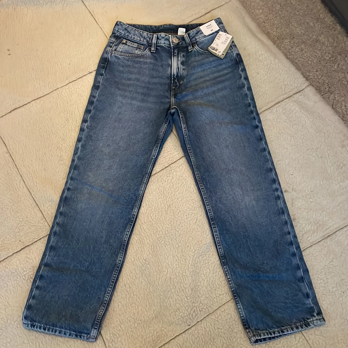 Blå jeans från H&M - 90