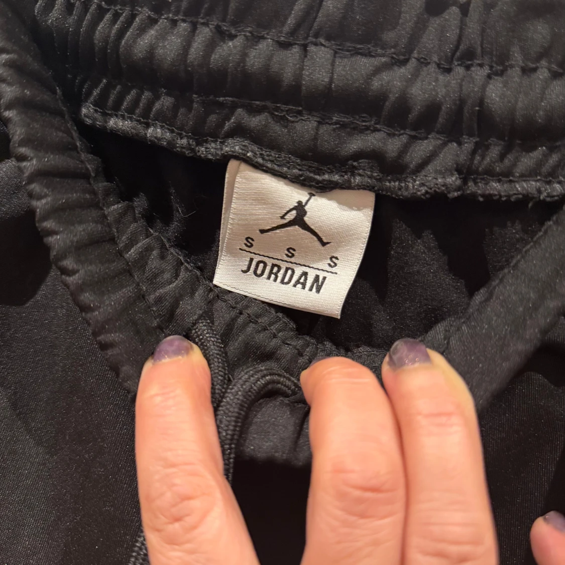 Grå och svart träningsjacka och byxor från Jordan - 92