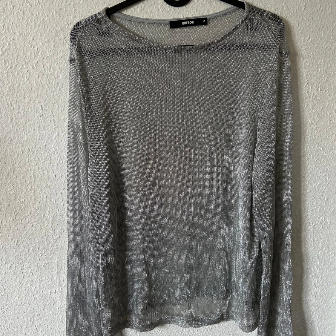 Silverfärgad meshtröja från BikBok