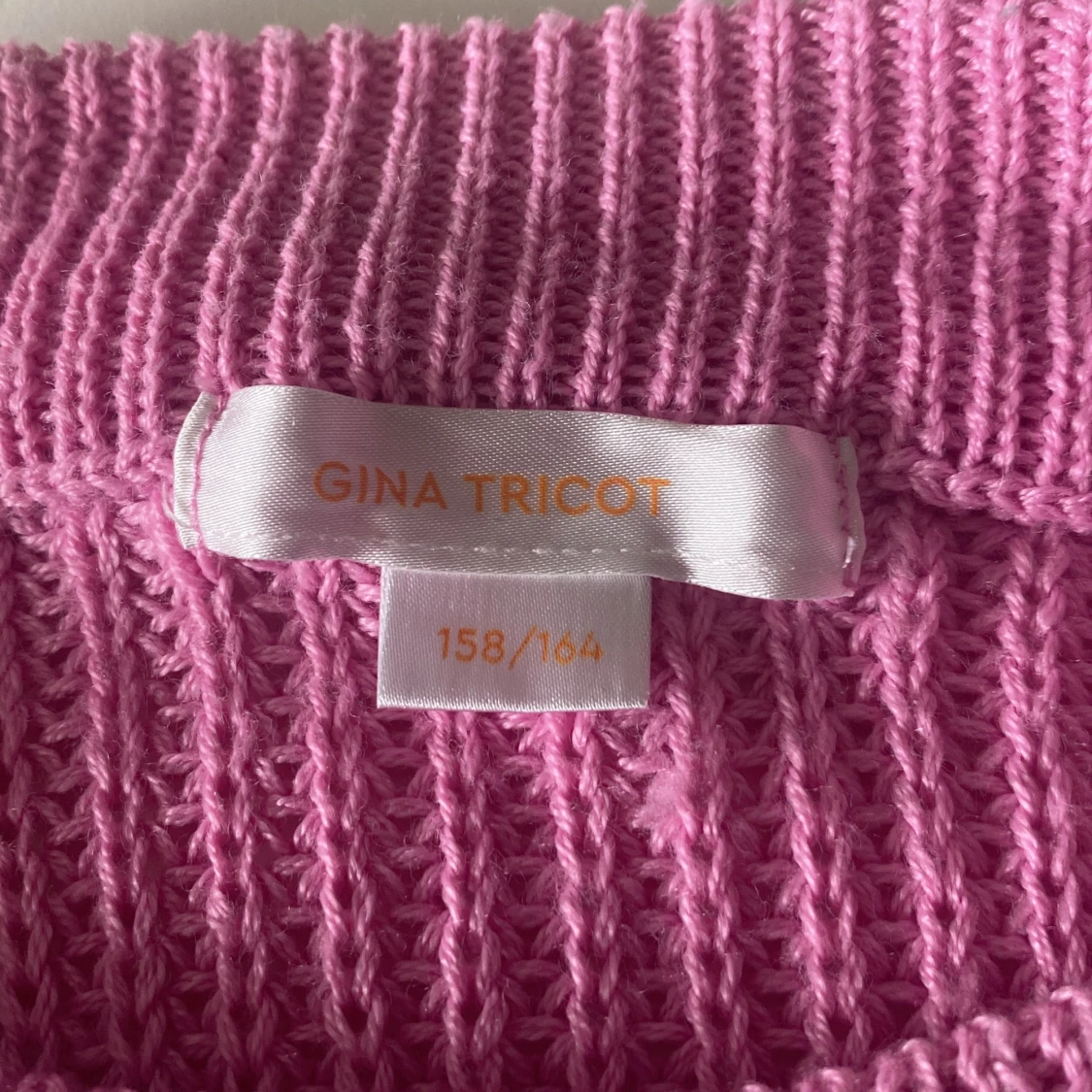 En rosa sticket tröja  - 91