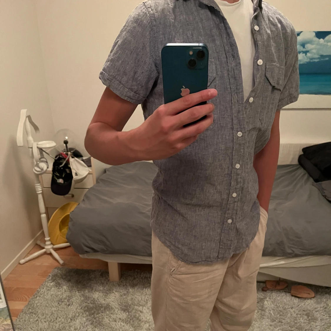 Ljusblå linneskjorta 