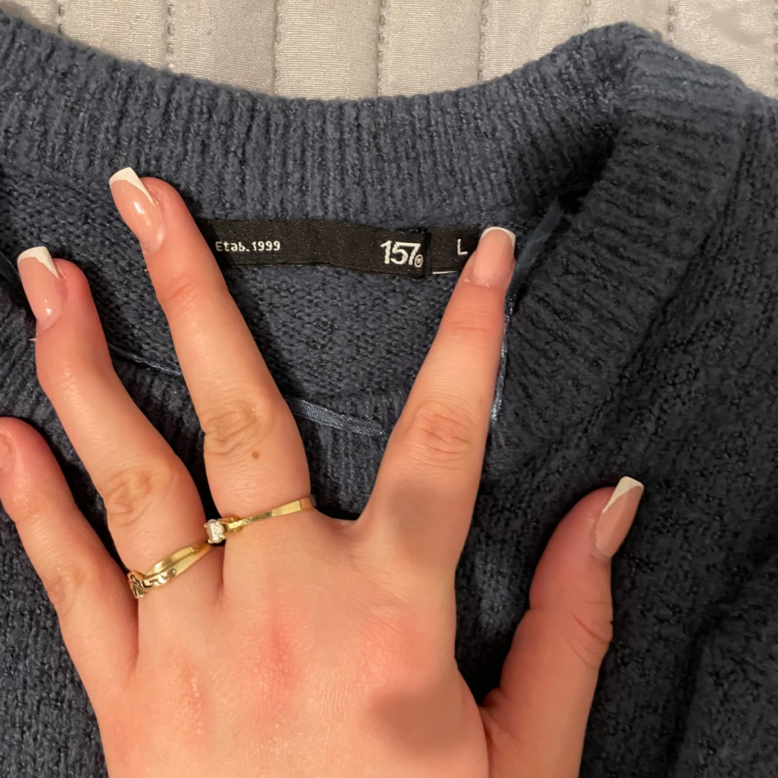 Blå stickad tröja från 157 - 1