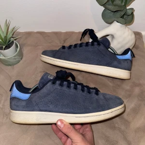 Adidas x Stan Smith Classic Suede - Adidas x Stan Smith Classic Suede Blue  Size: 42 Condition: Very Good  All defects are Always shown in the pictures if there are any!! Questions? Feel free to ask!  Checkout my account for more shoes, you might find a gem you size‼️ 
