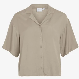 Kortärmad linne skjorta  - Oanvänd  Nyskick  