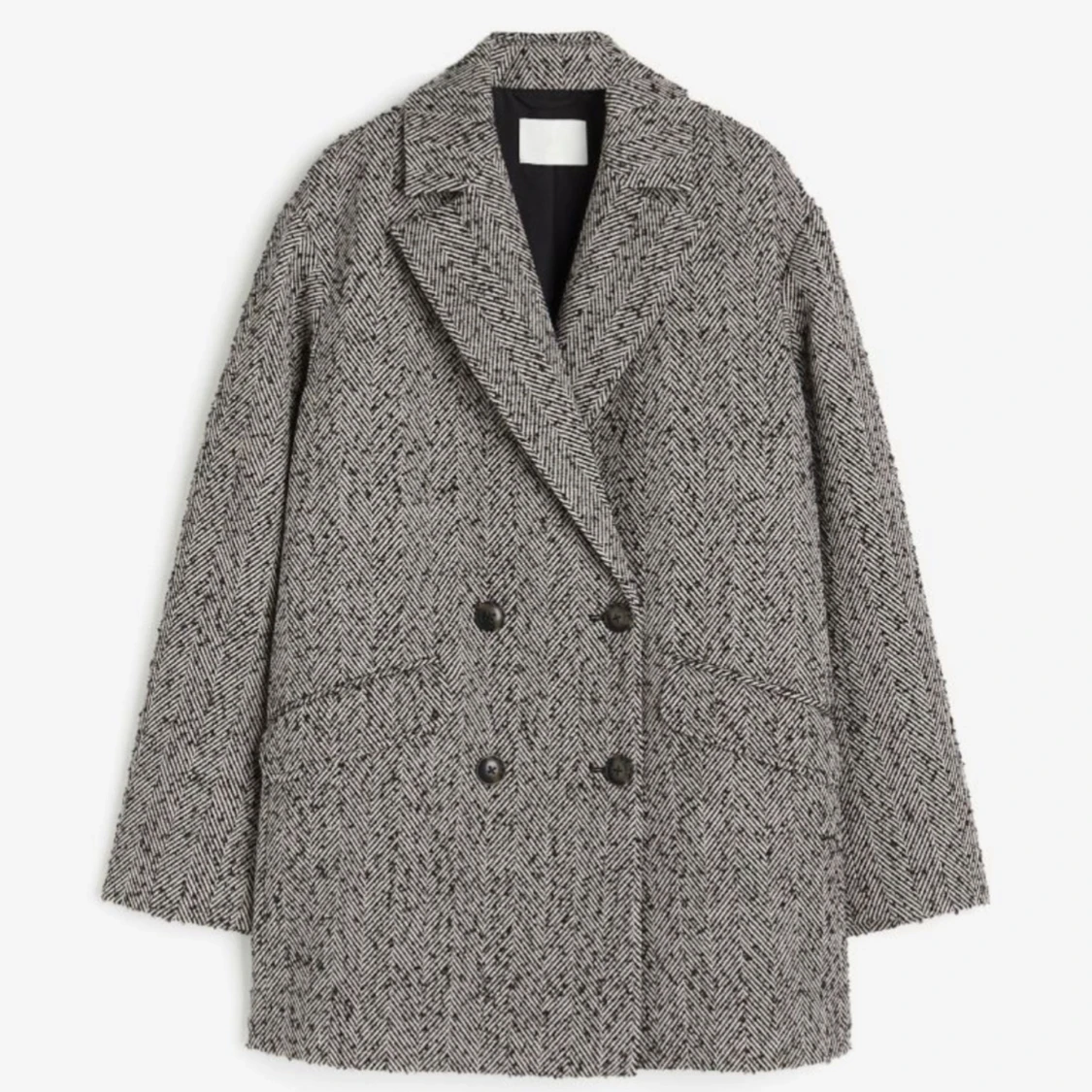 Grå kappa med fiskbensmönster