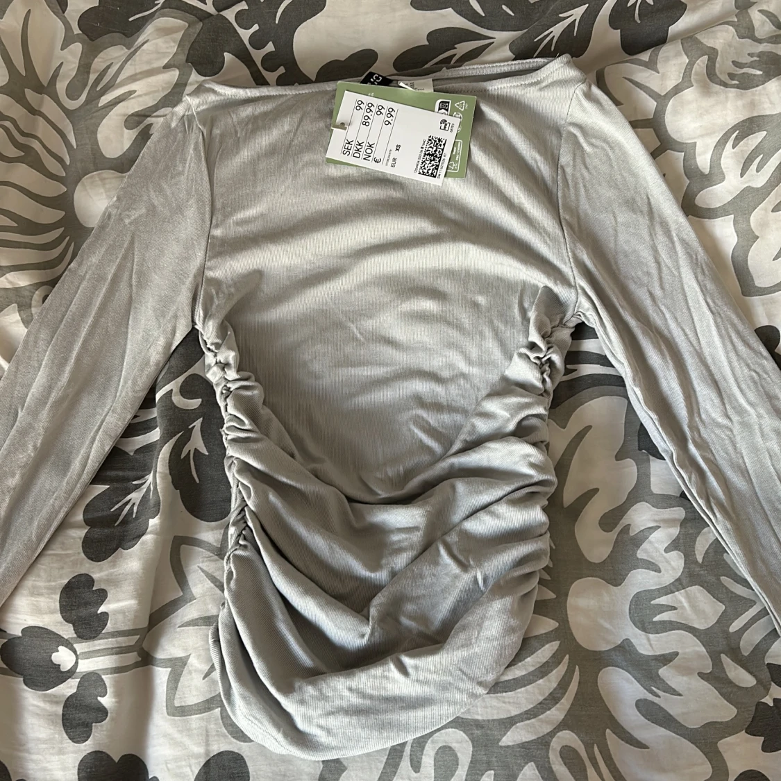 Ljusblå långärmad tröja 