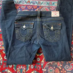 Low waist true religion skinny jeans.